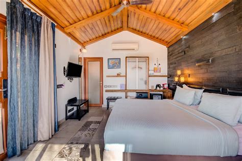 Rooms available at The Baga Beach Resort .